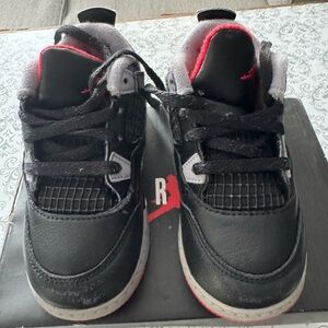 Nike Black and Red Sneakers with Breathable Design